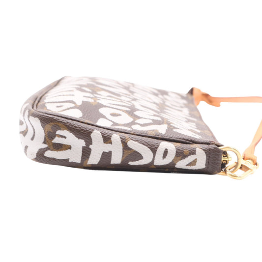 Monogram Graffiti Pochette Accessoires M92192 pouch Brown